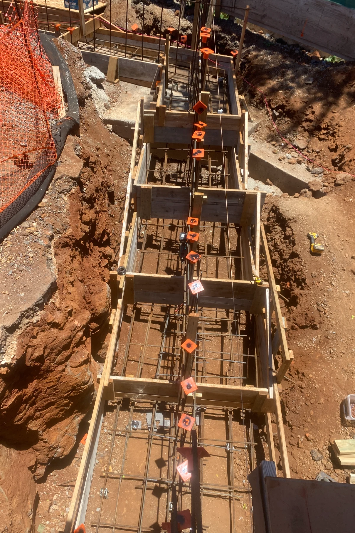 Retaining-wall footing preparation
